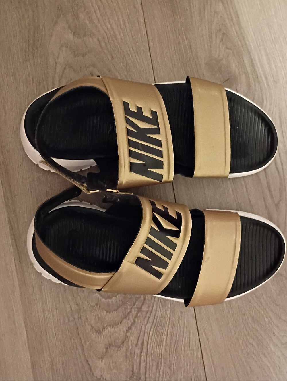 Nike Gold and Black Double Strap Sandals
